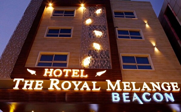A hotel sign with the name "The Royal Melange Beacon". - The Royal Melange Beacon (Ajmer)
