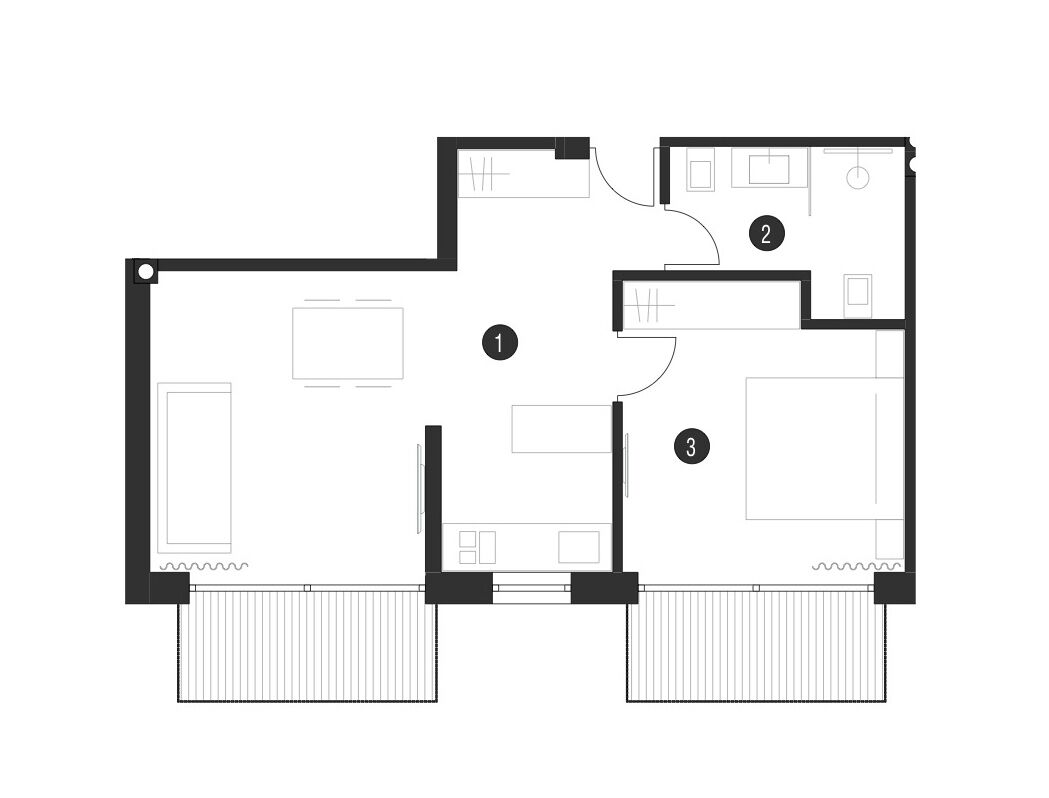 Un plano de planta que muestra tres habitaciones, un baño y una cocina.