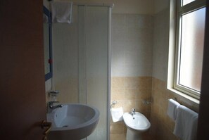 Shower, free toiletries, hair dryer, bidet