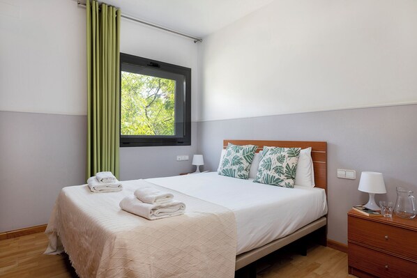 Blackout curtains, iron/ironing board, free WiFi, bed sheets