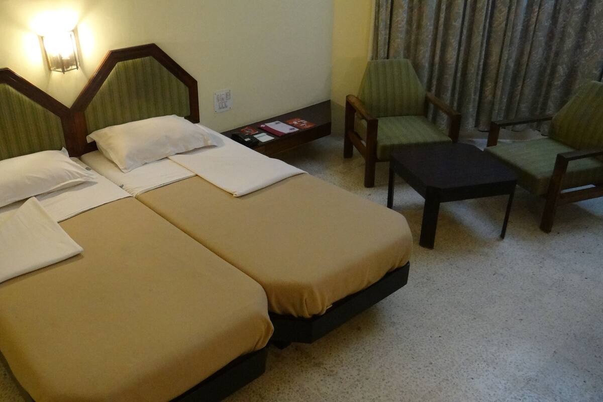 Desk, laptop workspace, iron/ironing board, rollaway beds