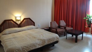 Desk, laptop workspace, iron/ironing board, rollaway beds