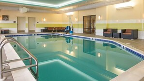 An indoor swimming pool with a clear blue water, tiled walls, and a pool ladder. - Comfort Suites Bossier City - Shreveport (Bossier City)