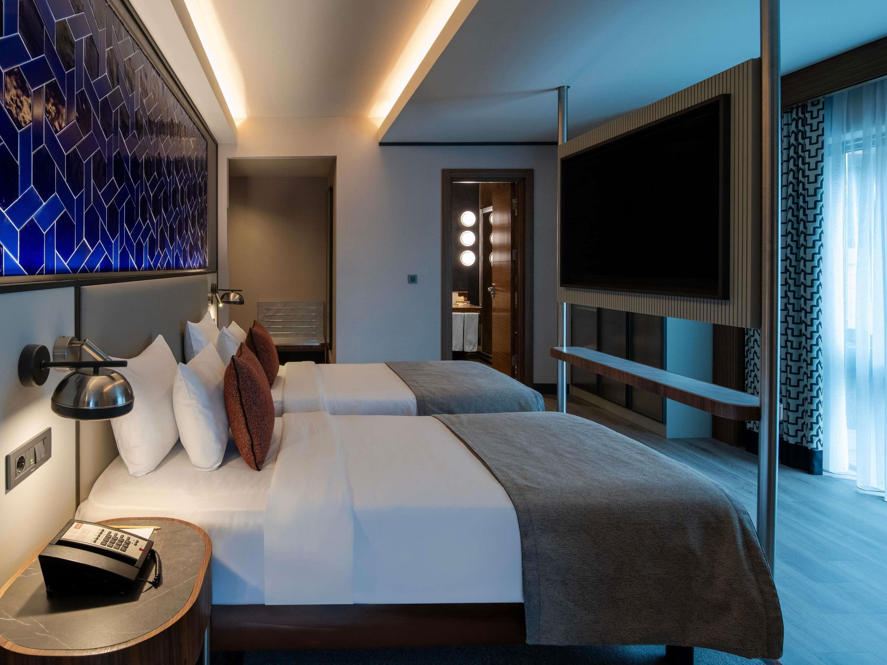 Superior Room, Multiple Beds | Down comforters, minibar, in-room safe, desk