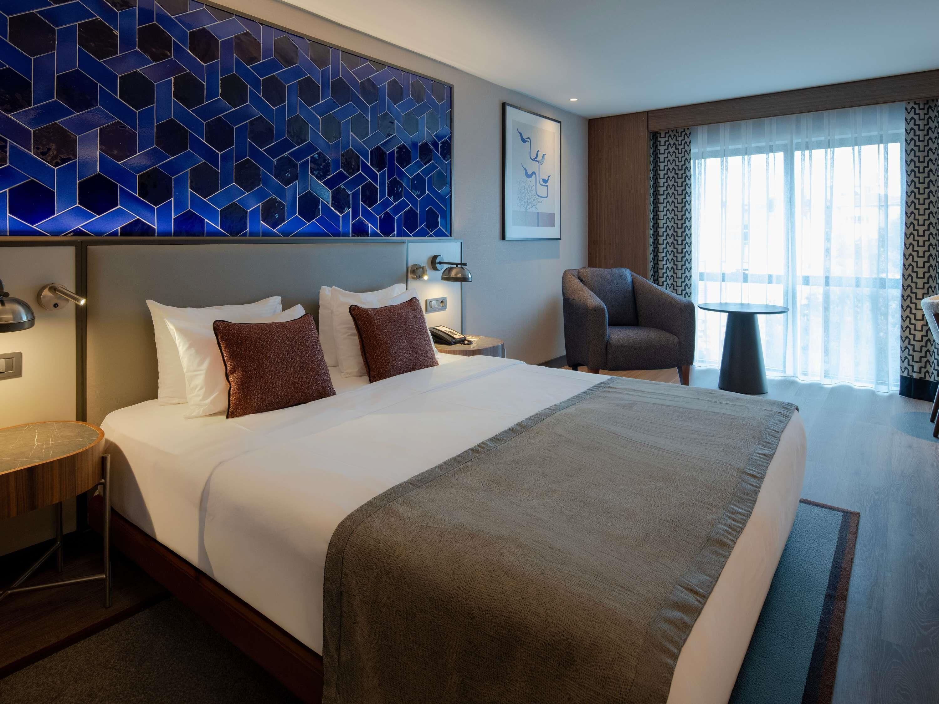 Down duvets, minibar, in-room safe, desk