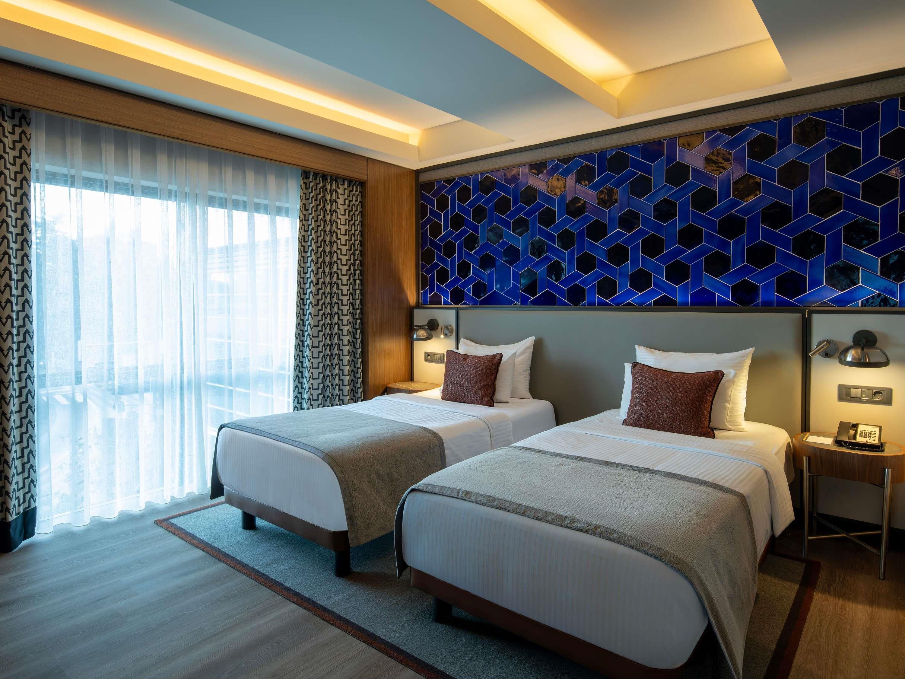 Junior Suite, 2 Twin Beds | Down comforters, minibar, in-room safe, desk