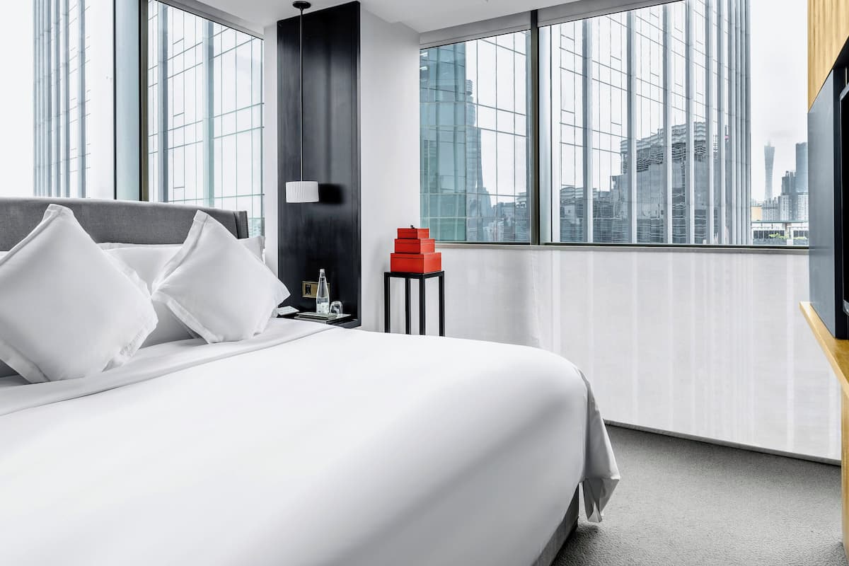 premium bedding, down duvets, minibar, in-room safe