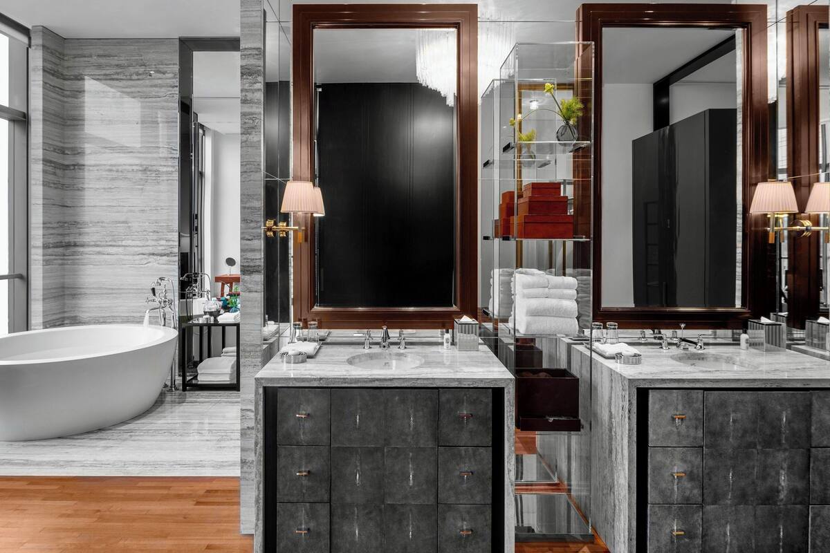 separate bathtub and shower, rainfall showerhead, designer toiletries