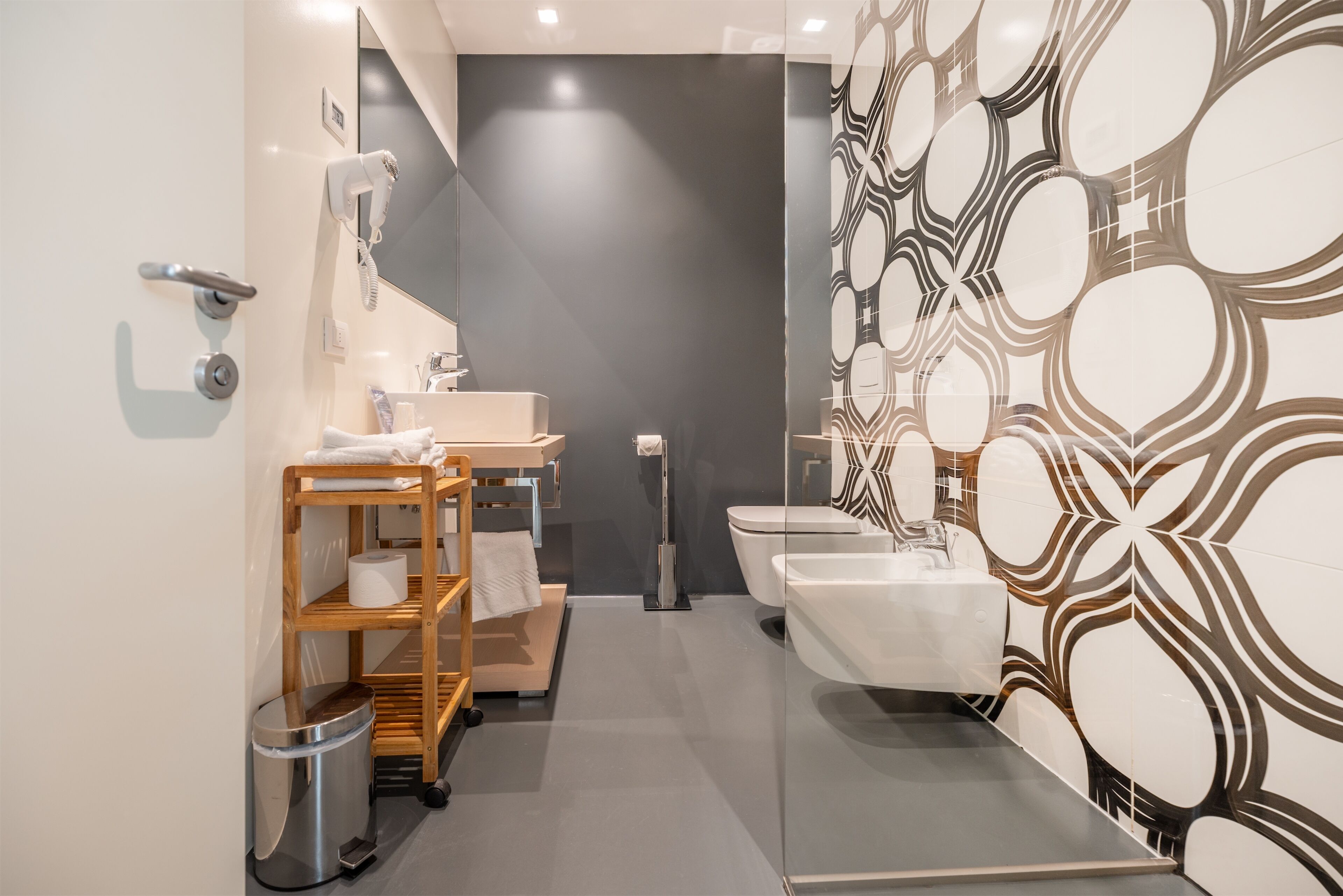 superior room | bathroom | shower, hair dryer, towels