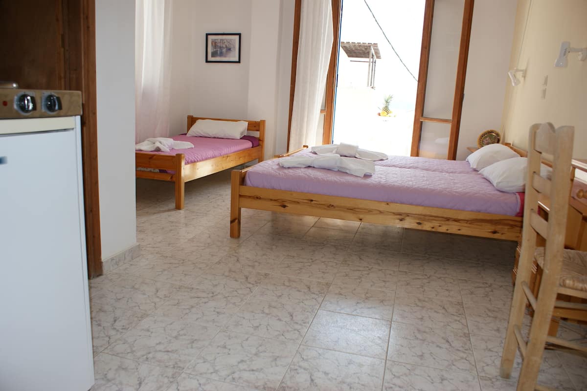 Triple Room, Sea View | Iron/ironing board, WiFi (free)