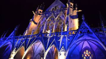 A Gothic-style building with pointed arches and intricate stained glass windows.