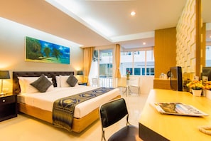 Deluxe Room, Balcony | Living area | 34-inch flat-screen TV with cable channels - Hallo Patong Hotel & Restaurant (Patong)