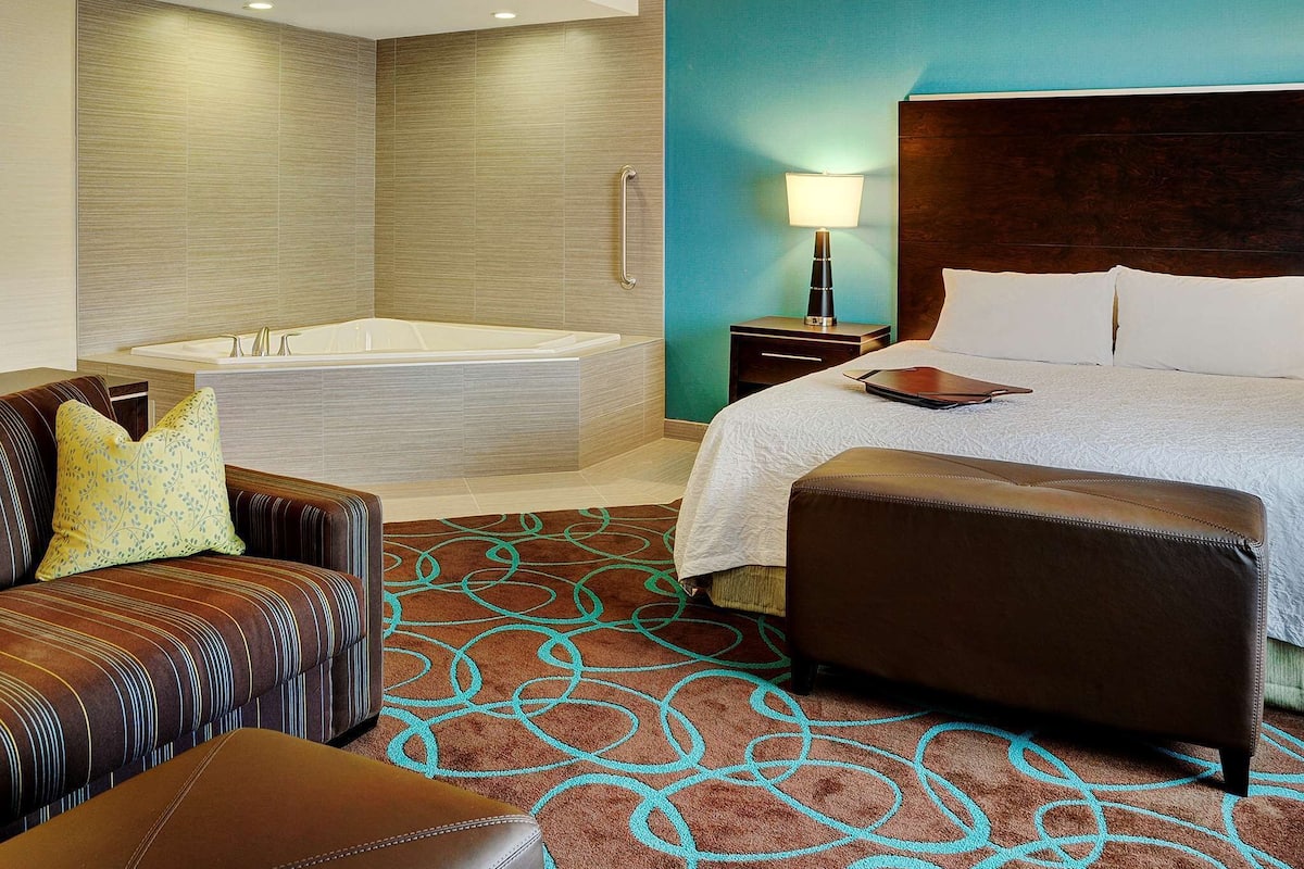 Suite, 1 King Bed, Non Smoking | Pillow-top beds, in-room safe, desk, iron/ironing board