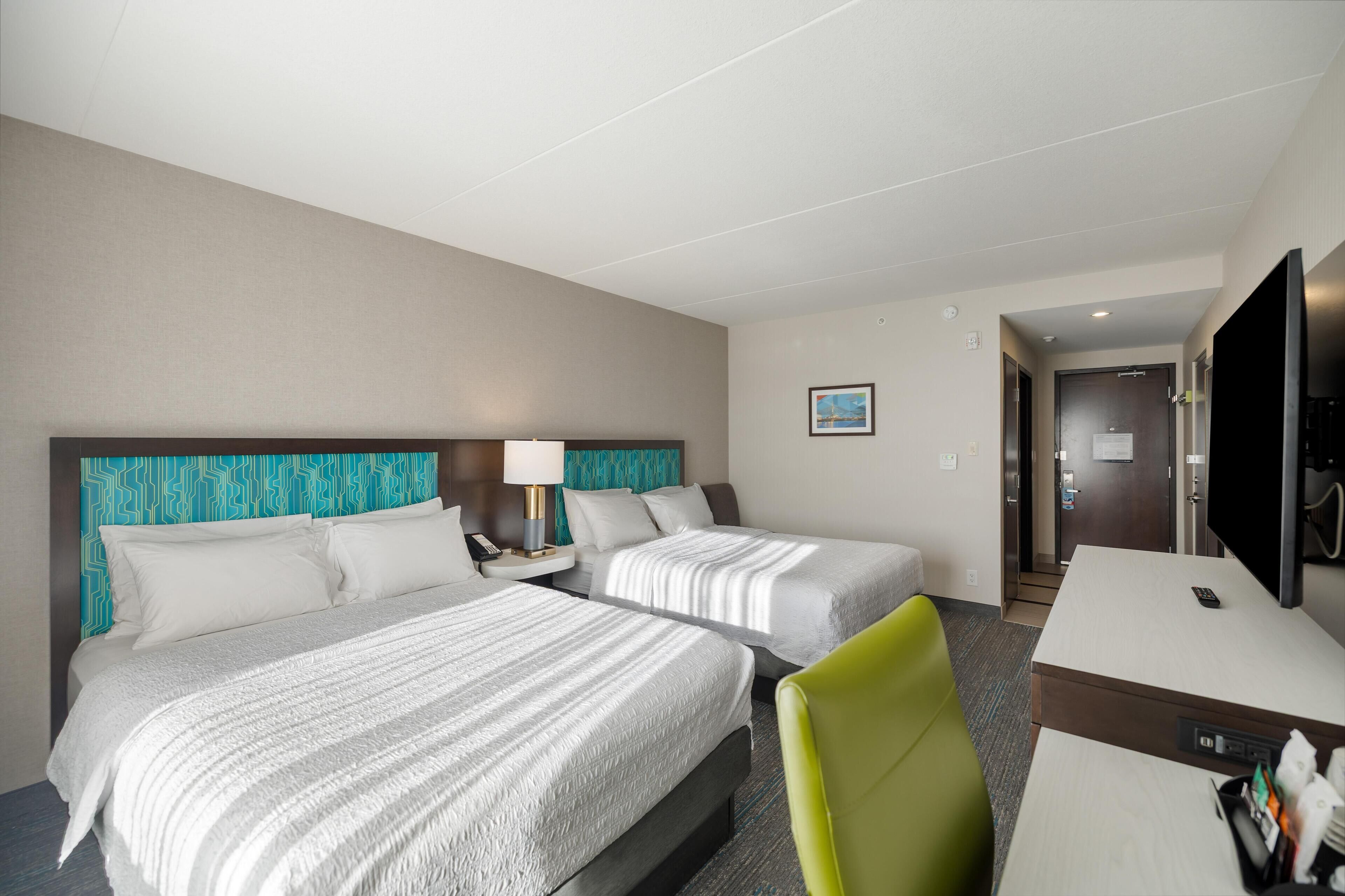 Room, 2 Queen Beds, Non Smoking | Pillowtop beds, in-room safe, desk, iron/ironing board