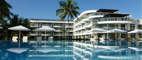 Outdoor pool, pool umbrellas, pool loungers