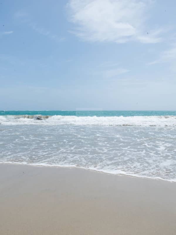 On the beach, sun loungers, beach umbrellas, beach towels