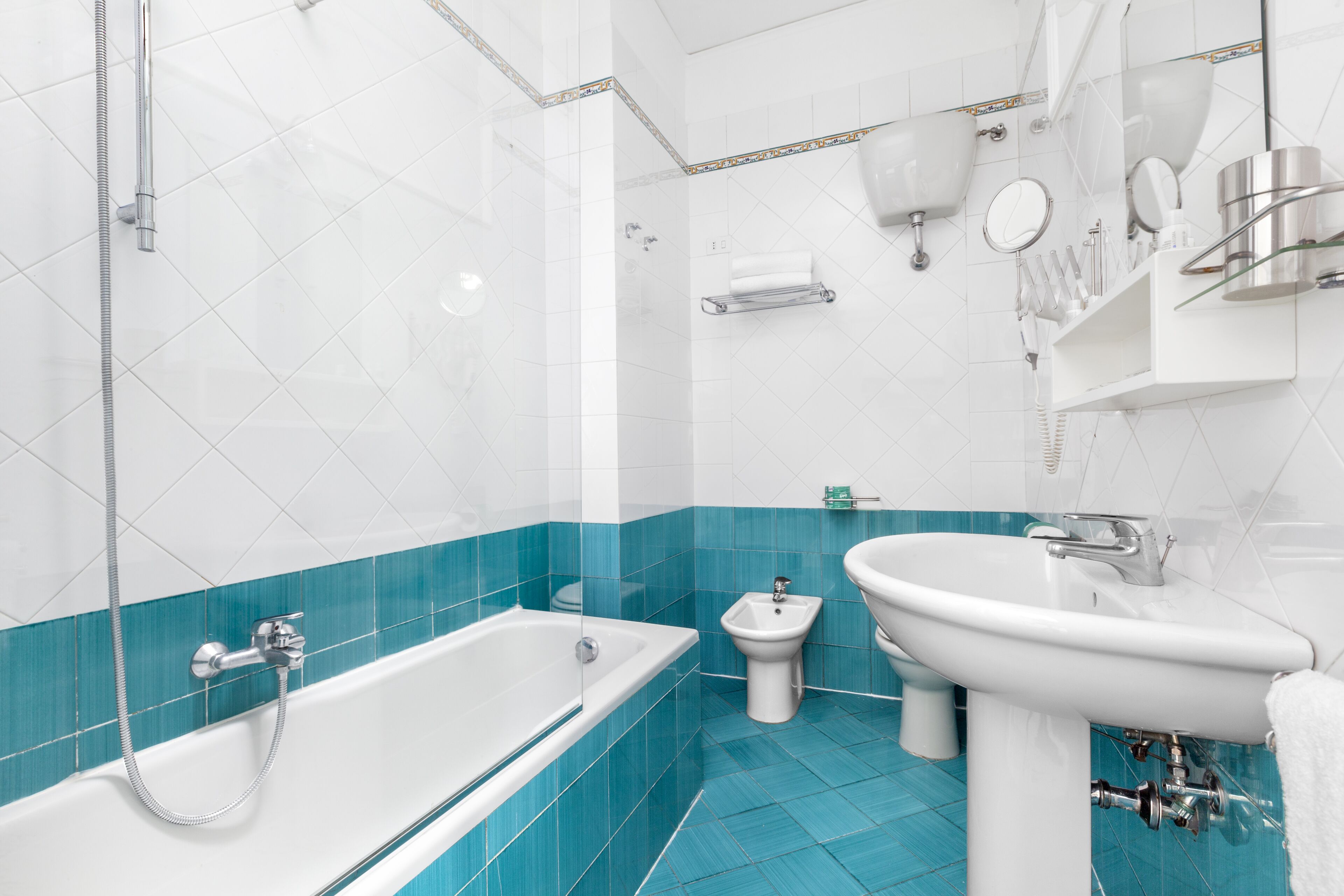 free toiletries, hair dryer, bidet, towels