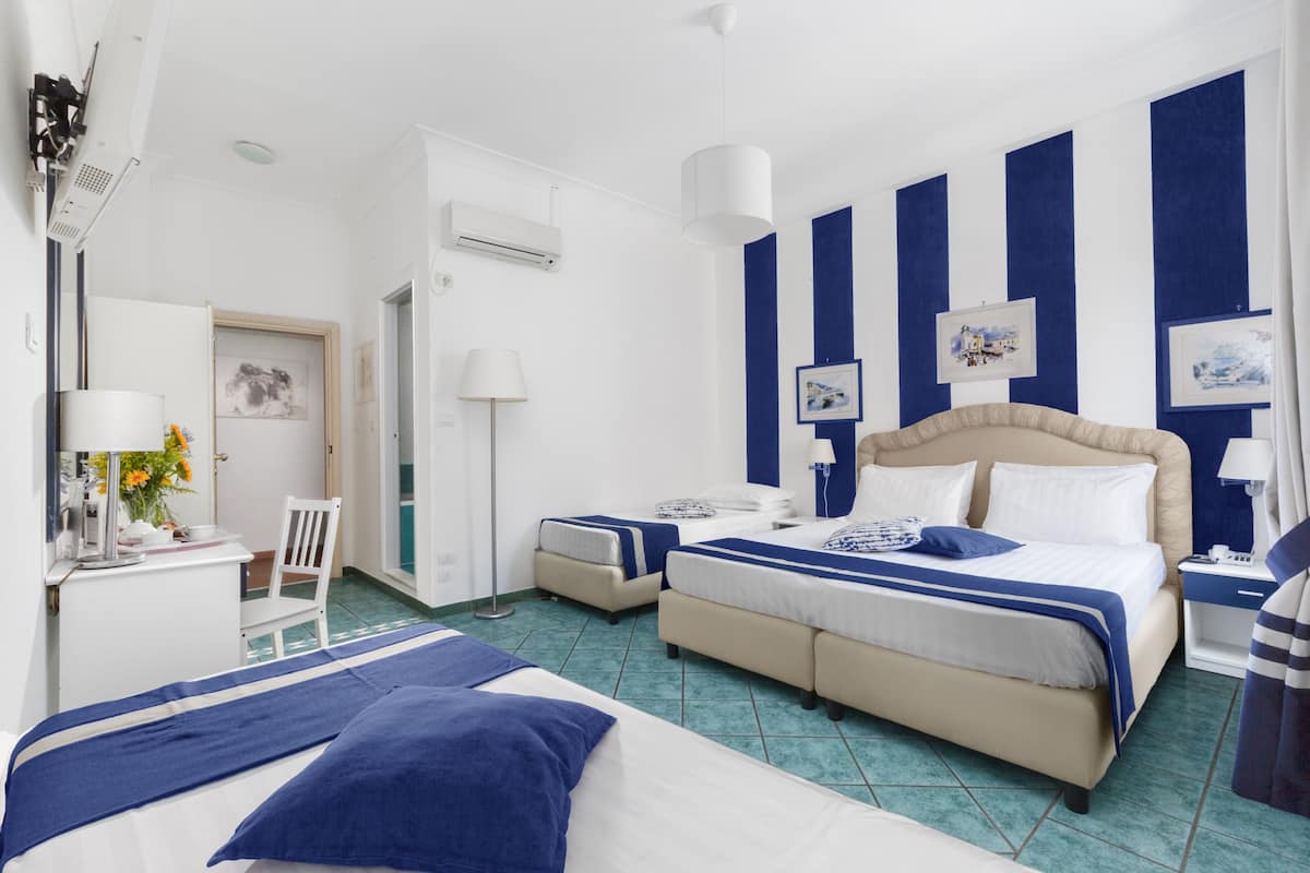 Superior Quadruple Room | Premium bedding, down duvets, minibar, in-room safe