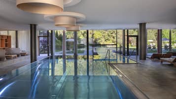 Indoor pool, outdoor pool, pool umbrellas, pool loungers