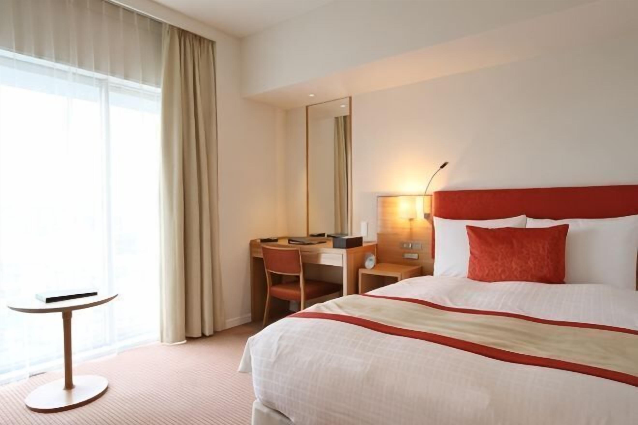 Premium bedding, down comforters, memory foam beds, in-room safe