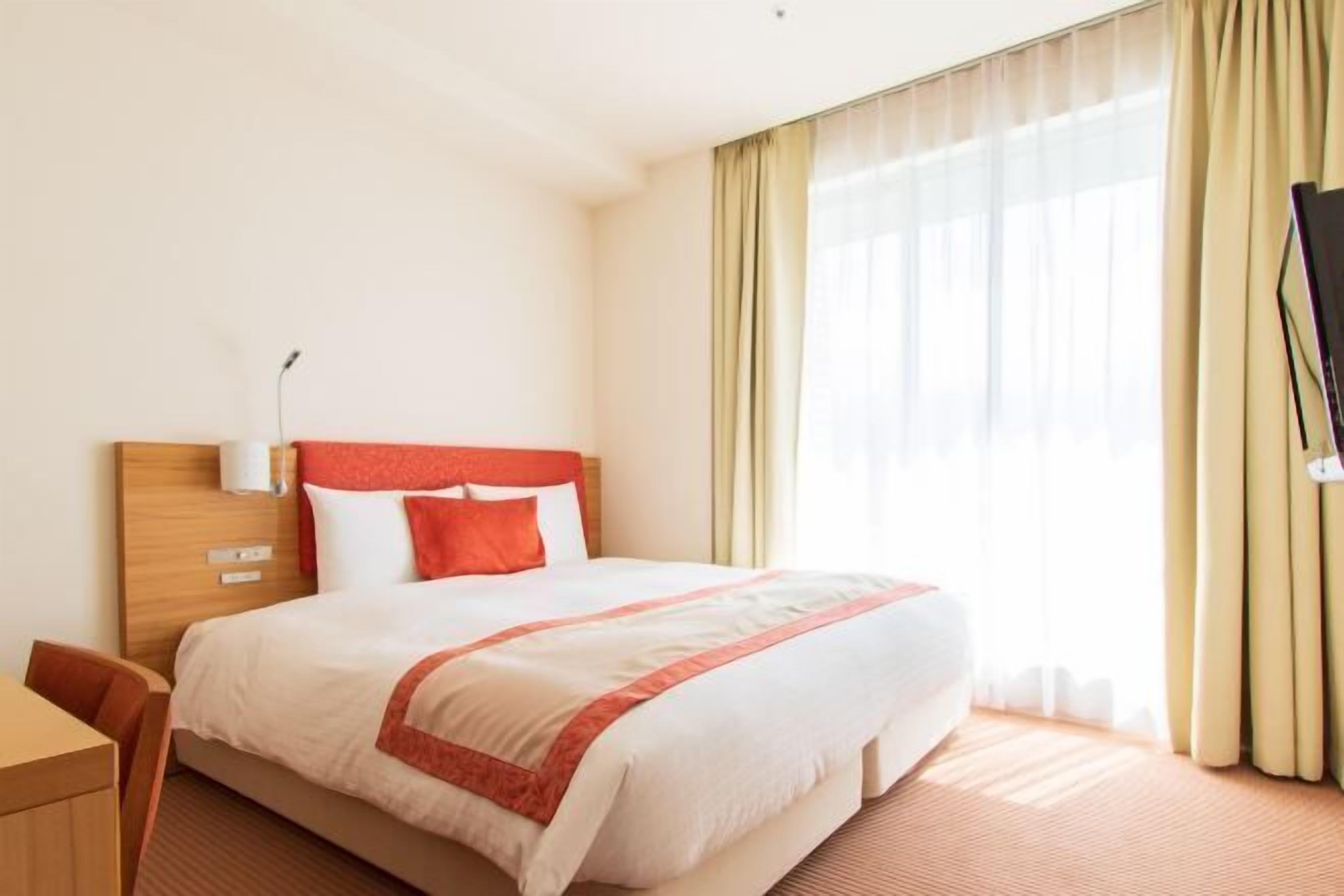 Premium bedding, down comforters, memory foam beds, in-room safe