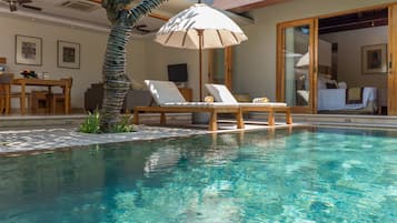 Outdoor pool, pool umbrellas, pool loungers