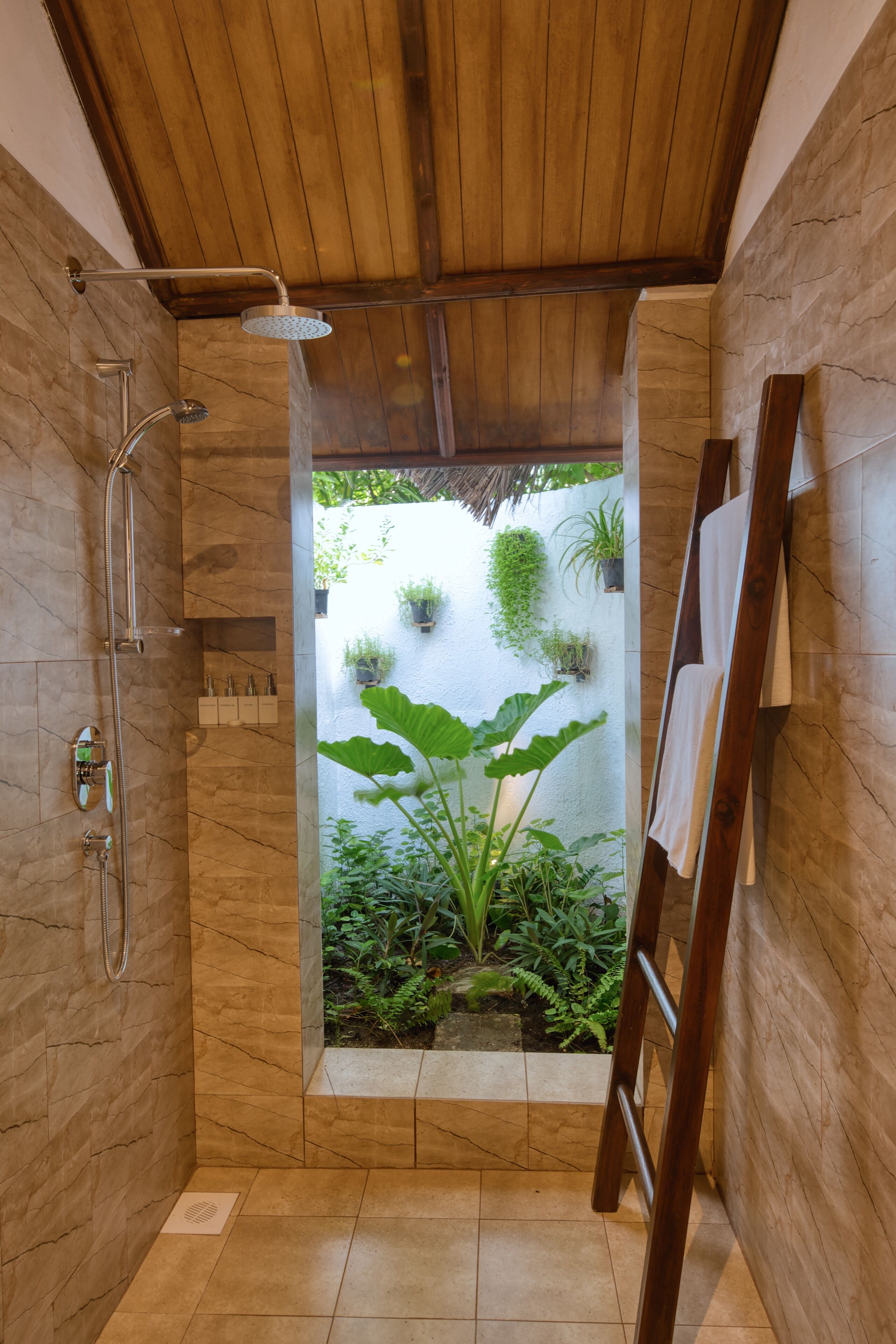 deluxe beach bungalow | bathroom | shower, free toiletries, hair dryer, towels