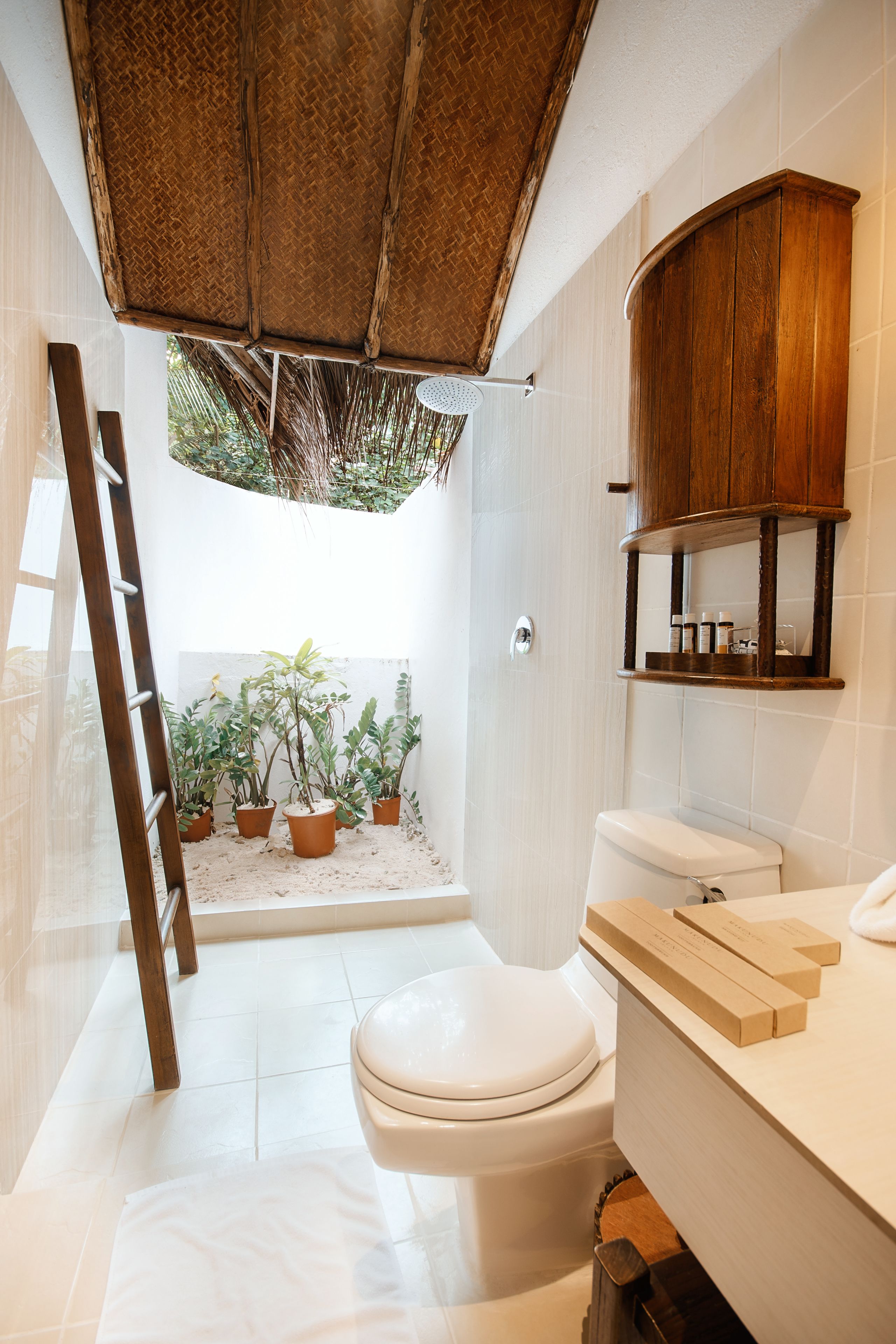 deluxe beach bungalow | bathroom | shower, free toiletries, hair dryer, towels