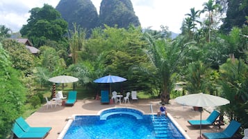 Outdoor pool, pool umbrellas, sun loungers