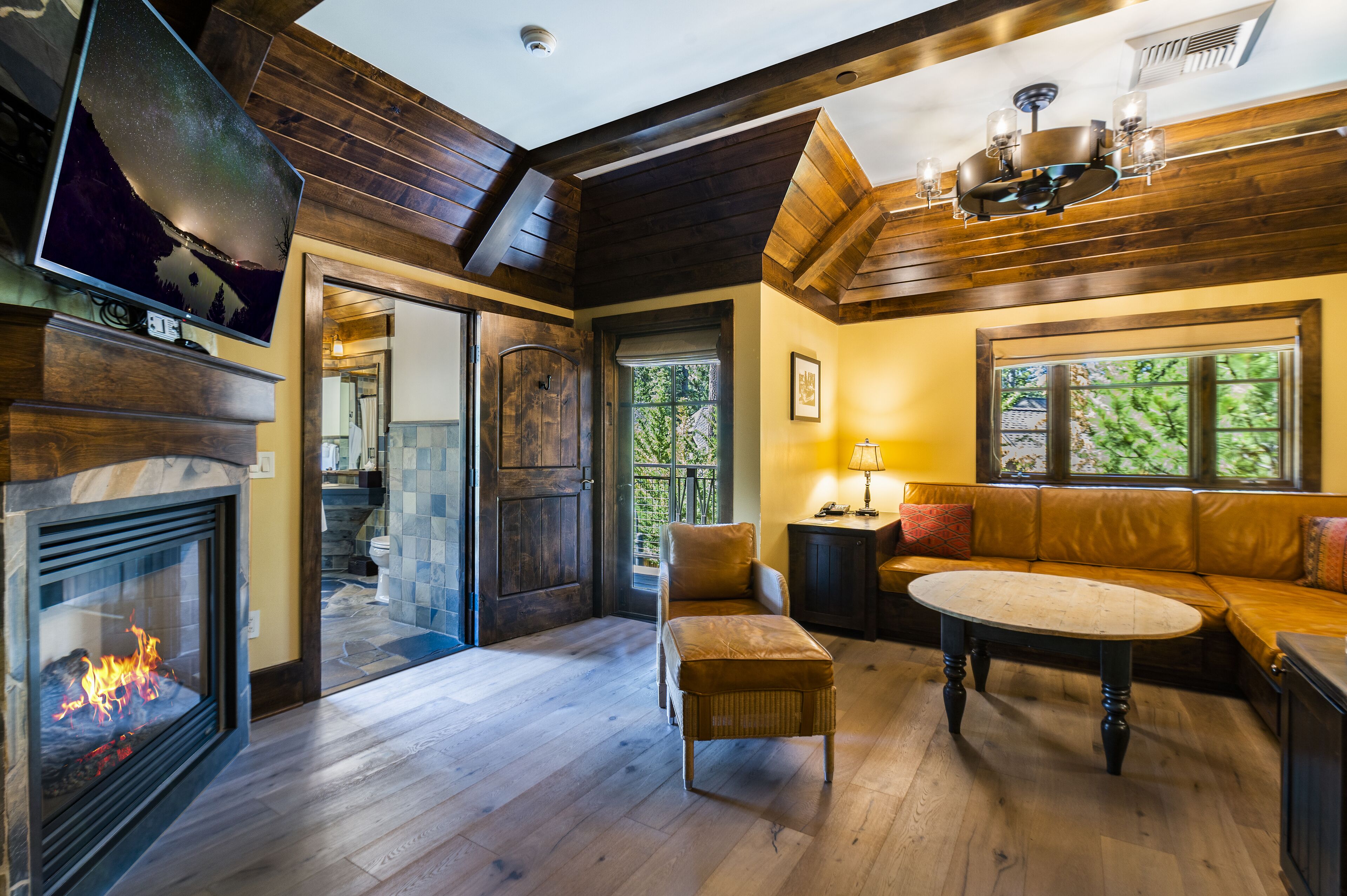 mckinney suite, king bed with mountain view | living room | flat-screen tv, fireplace, streaming services