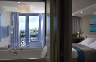 Superior Double or Twin Room, Sea View | Minibar, in-room safe, individually decorated, individually furnished