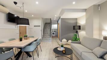 City Duplex | Living area | 42-inch flat-screen TV with digital channels, TV