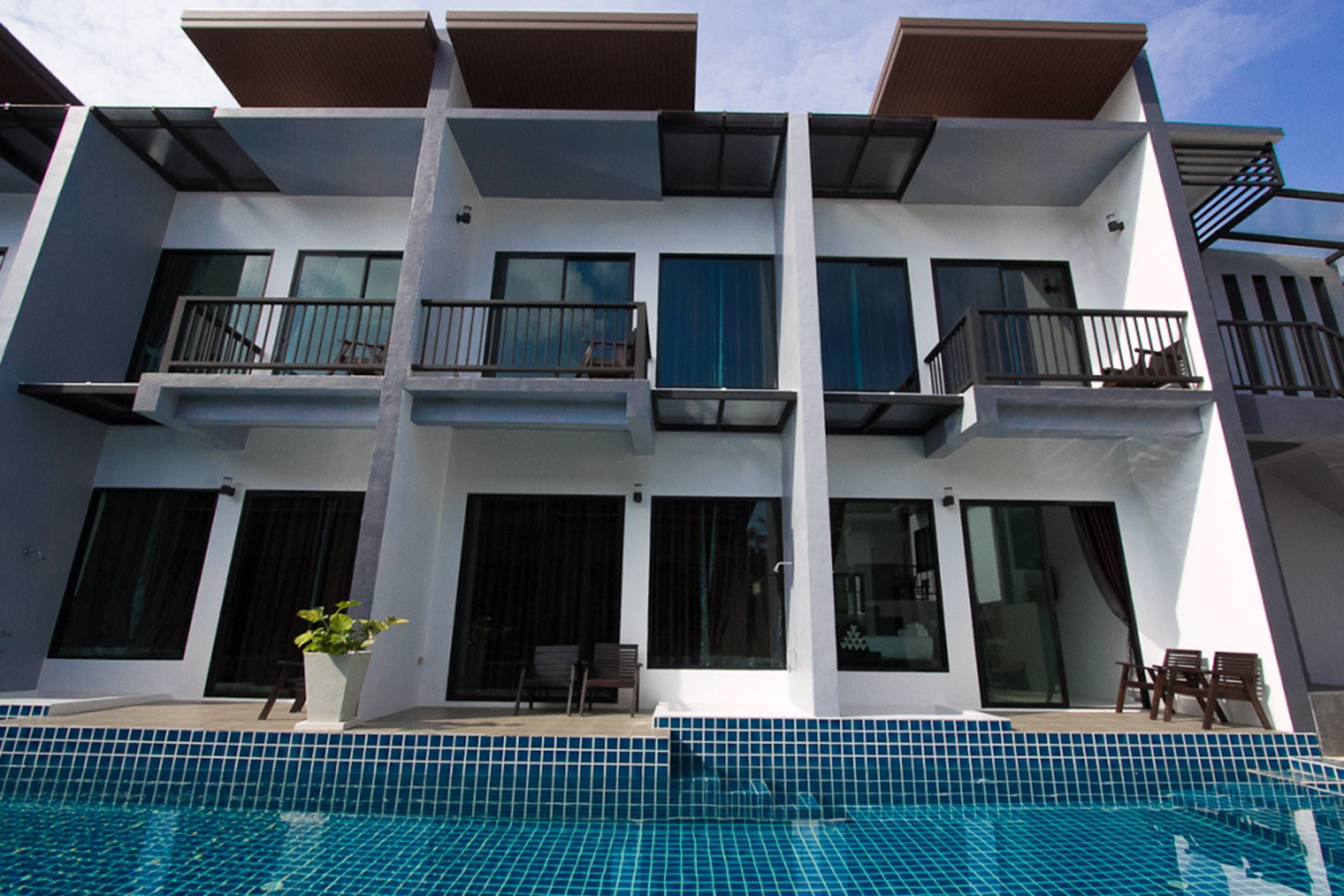 Deluxe Room, Pool Access | In-room safe, individually decorated, individually furnished, desk