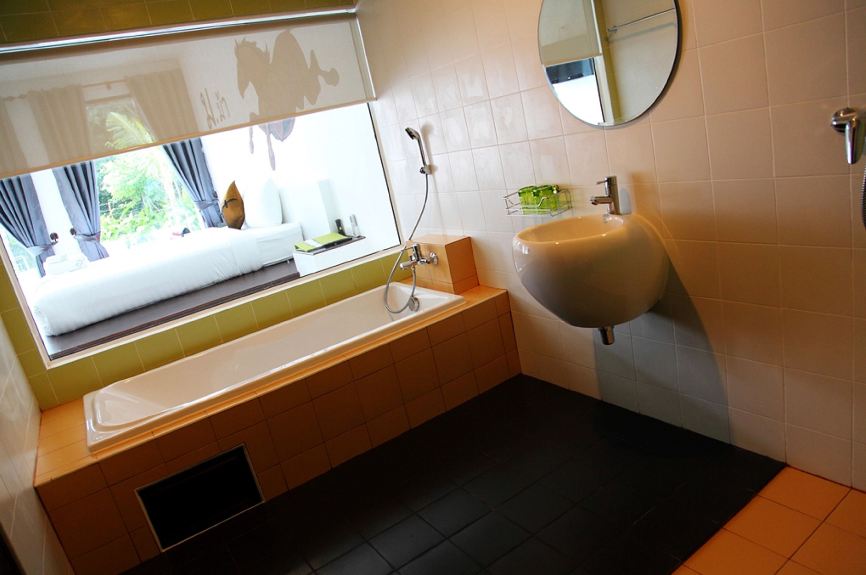 deluxe room, pool access | bathroom | separate bathtub and shower, hair dryer, towels