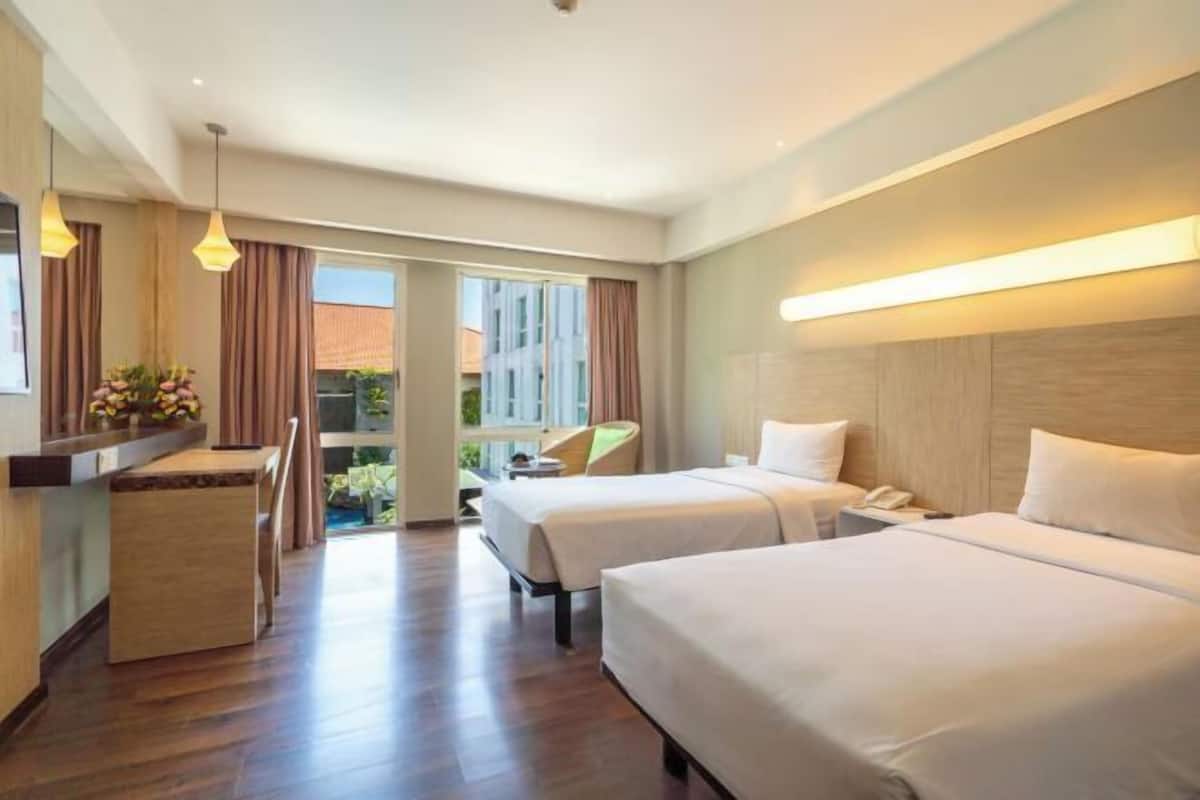 Premium bedding, in-room safe, desk, iron/ironing board (on request)