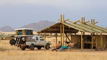 Tente (Site, no Tent provided) | Draps fournis