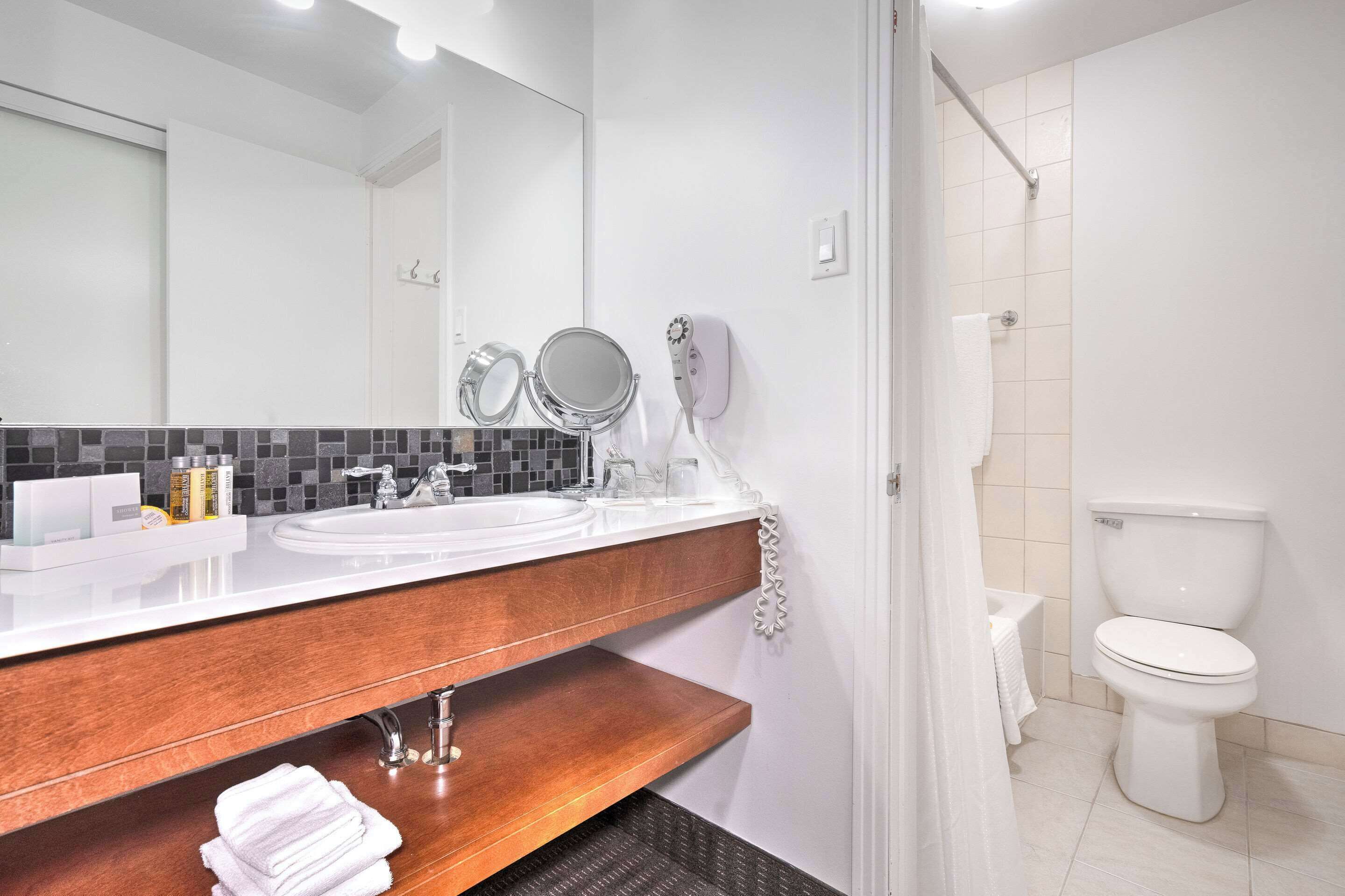standard room, 2 queen beds, non smoking, balcony | bathroom | hair dryer, bathrobes, towels, soap