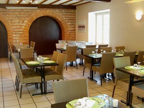 Breakfast, lunch, dinner served; local cuisine 