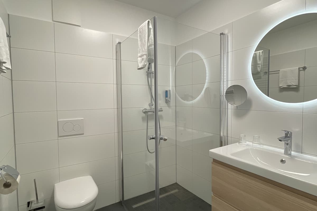 shower, free toiletries, hair dryer, bathrobes