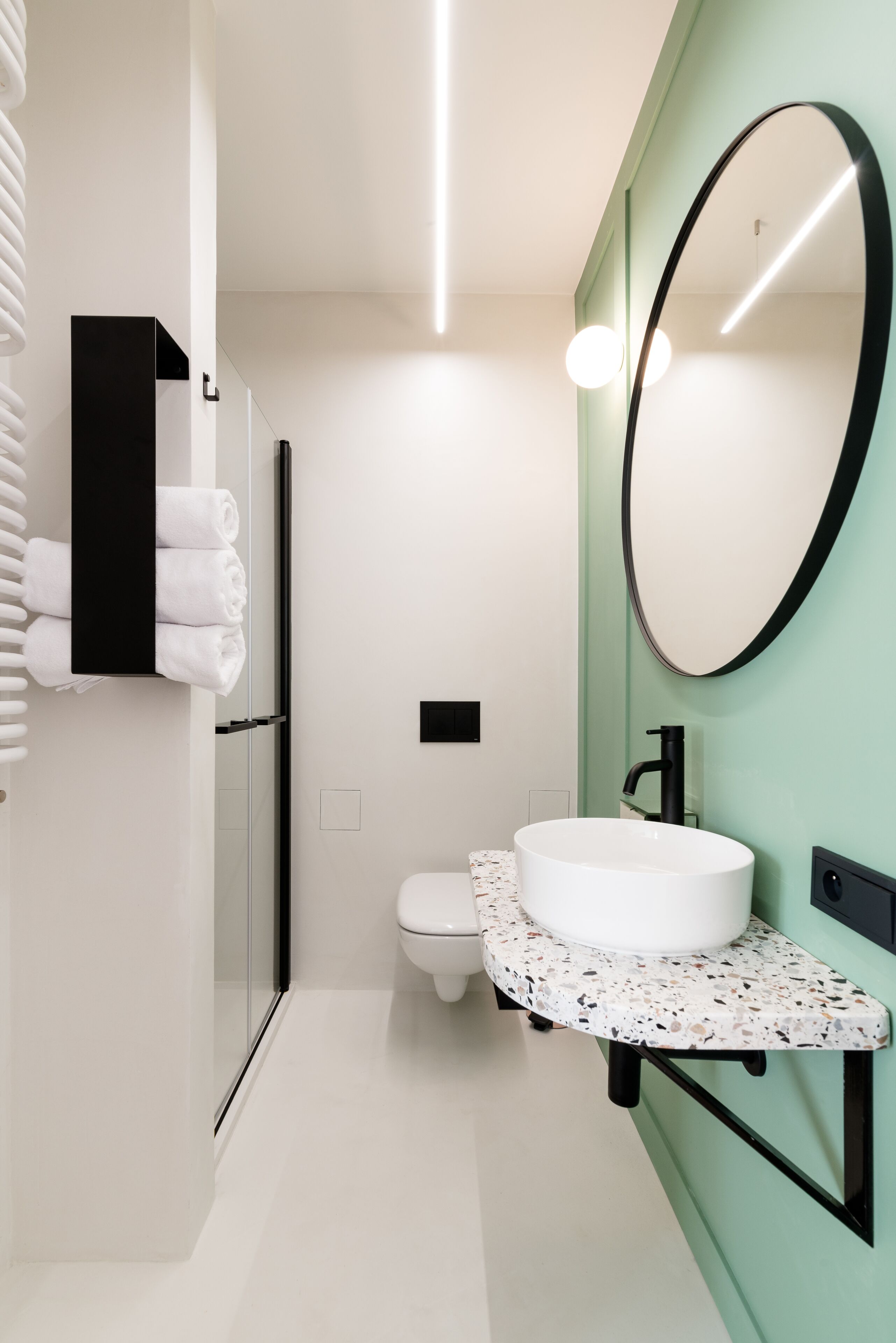 hair dryer, bathrobes, slippers, towels