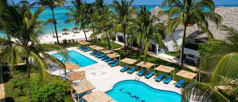 2 outdoor pools, open 8:00 AM to 9:30 PM, pool umbrellas, sun loungers