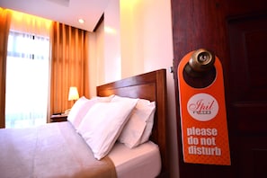Superior King Room | 1 dormitorio y ropa de cama