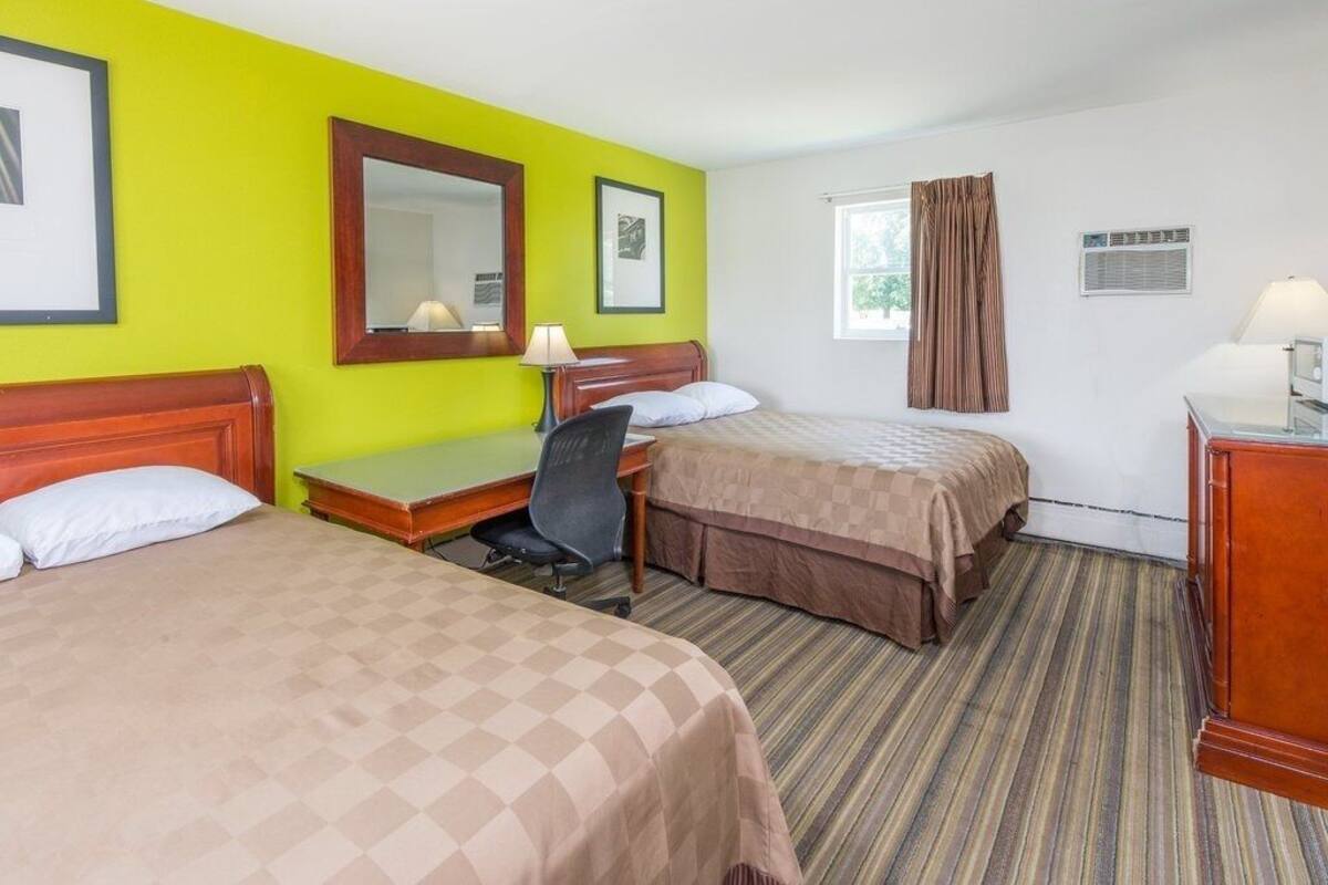 Blackout curtains, iron/ironing board, free WiFi, alarm clocks