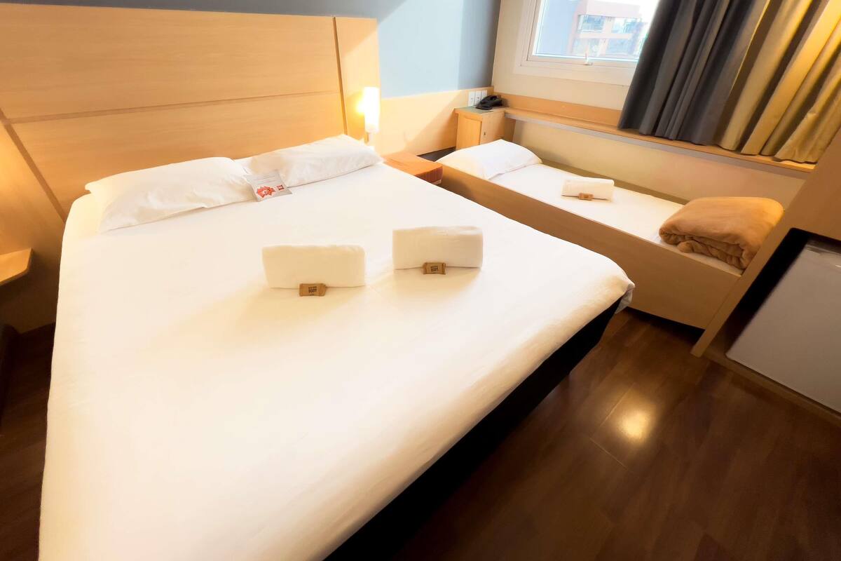 Standard Room, Multiple Beds | Minibar, in-room safe, desk, iron/ironing board (on request)