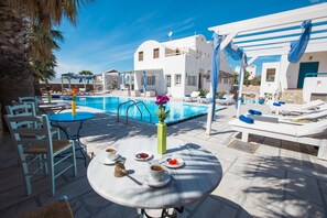 Outdoor pool, pool umbrellas, pool loungers