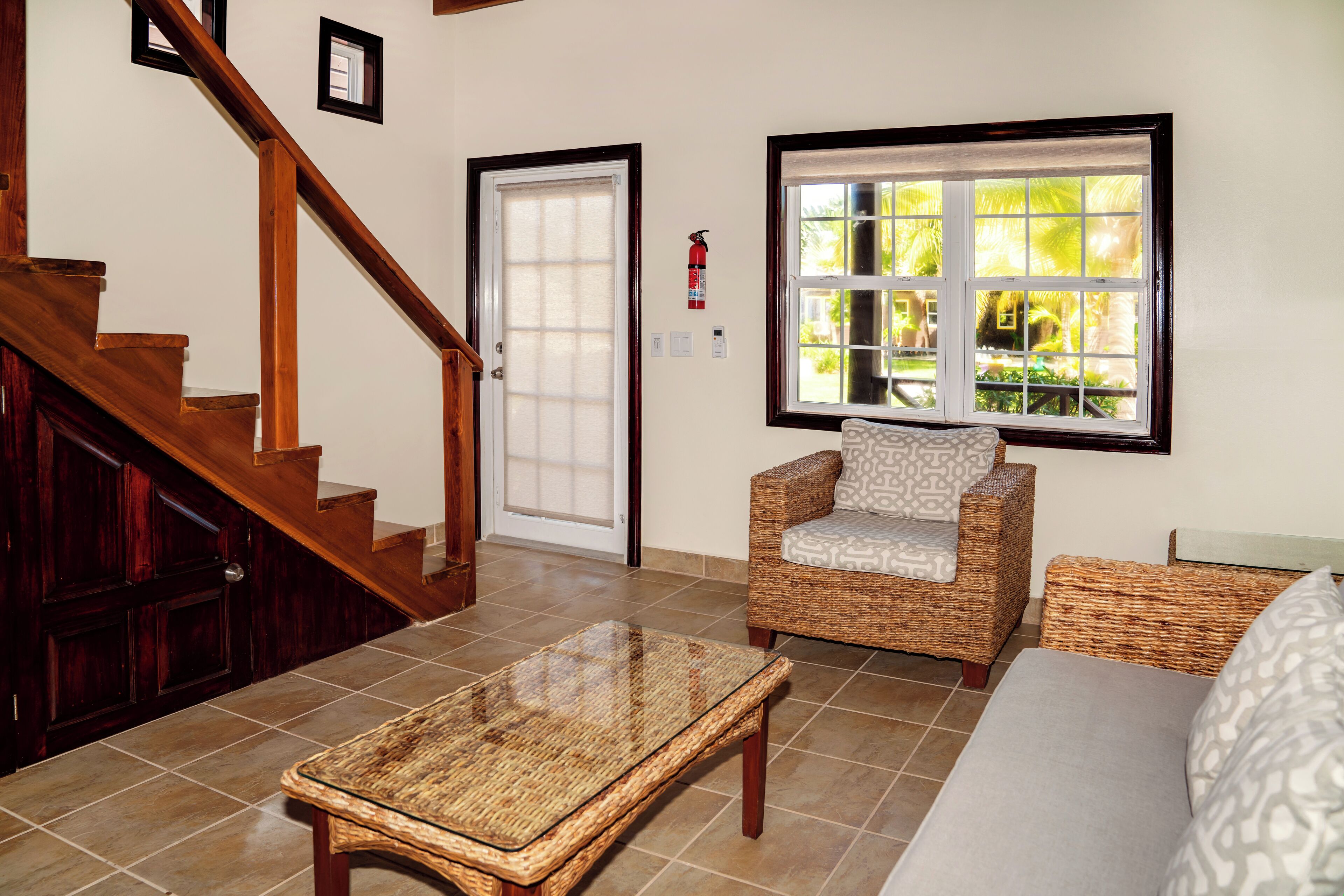 one bedroom plus den garden view villa | living area | 32-inch tv with cable channels, netflix, dvd player