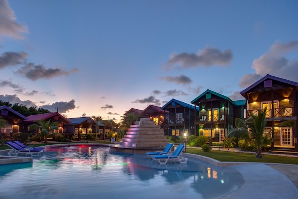 2 outdoor pools, pool umbrellas, pool loungers - X'Tan Ha - The Waterfront Resort (San Pedro)