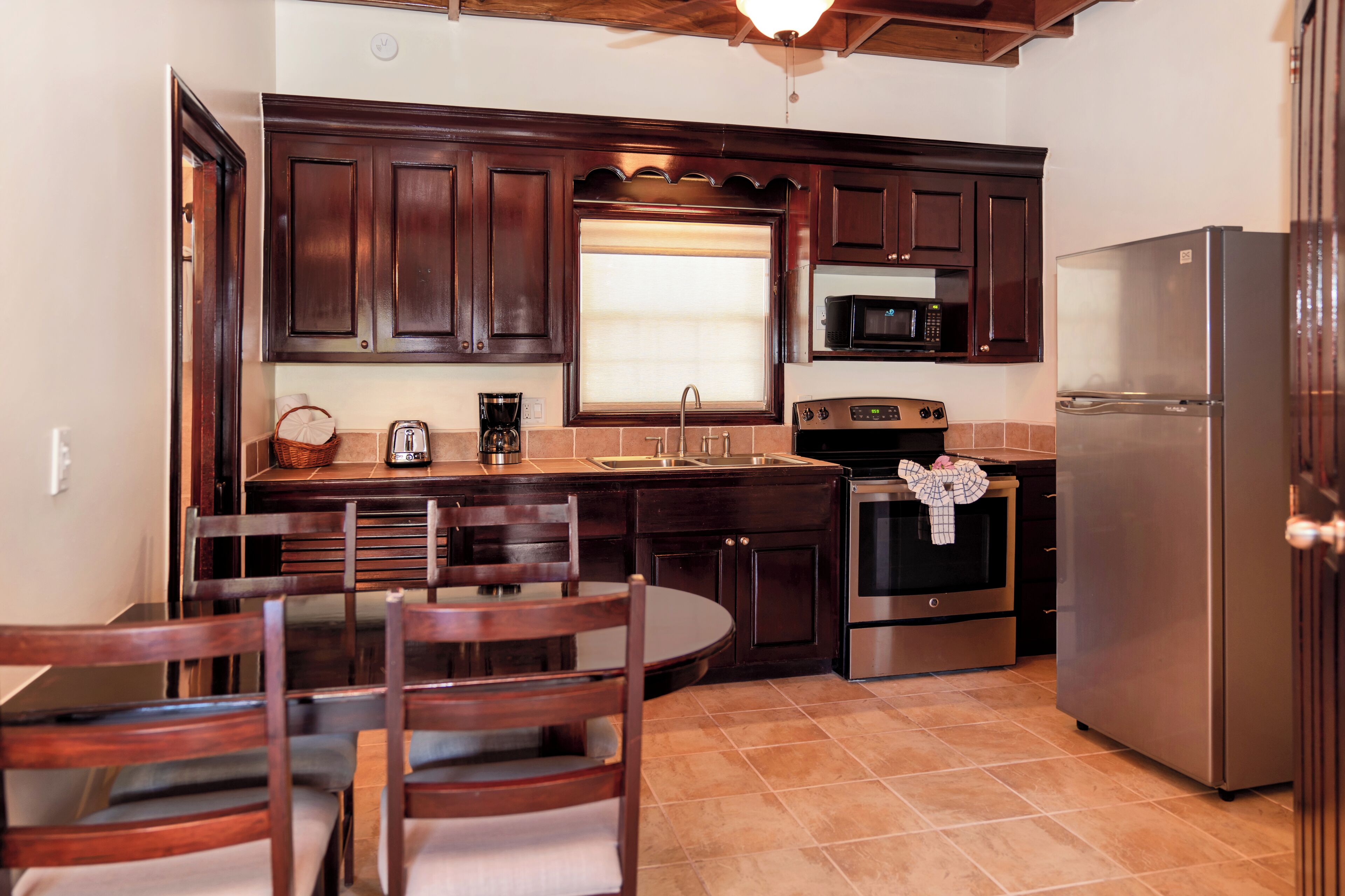 one bedroom plus den garden view villa | private kitchen | fridge, microwave, coffee/tea maker, cookware/dishes/utensils