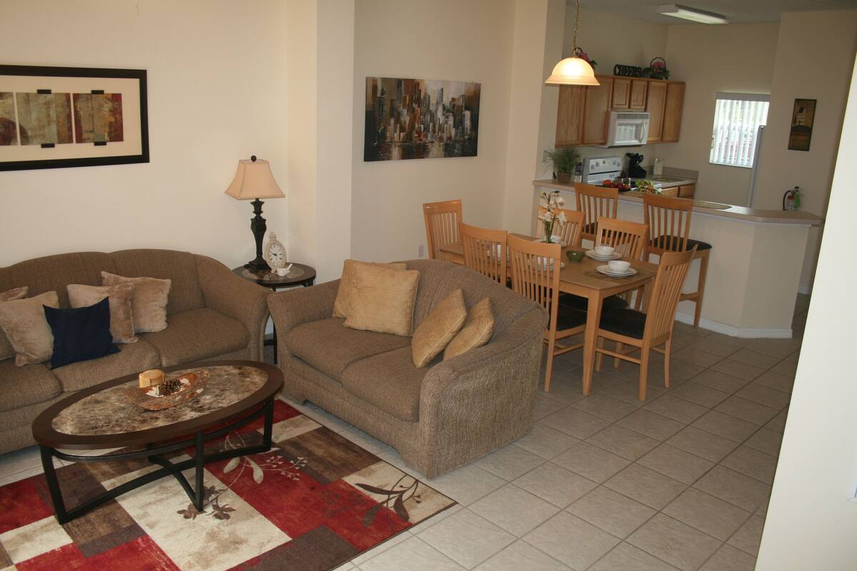 Townhome, 3 Bedrooms | Living area | 32-inch TV with cable channels