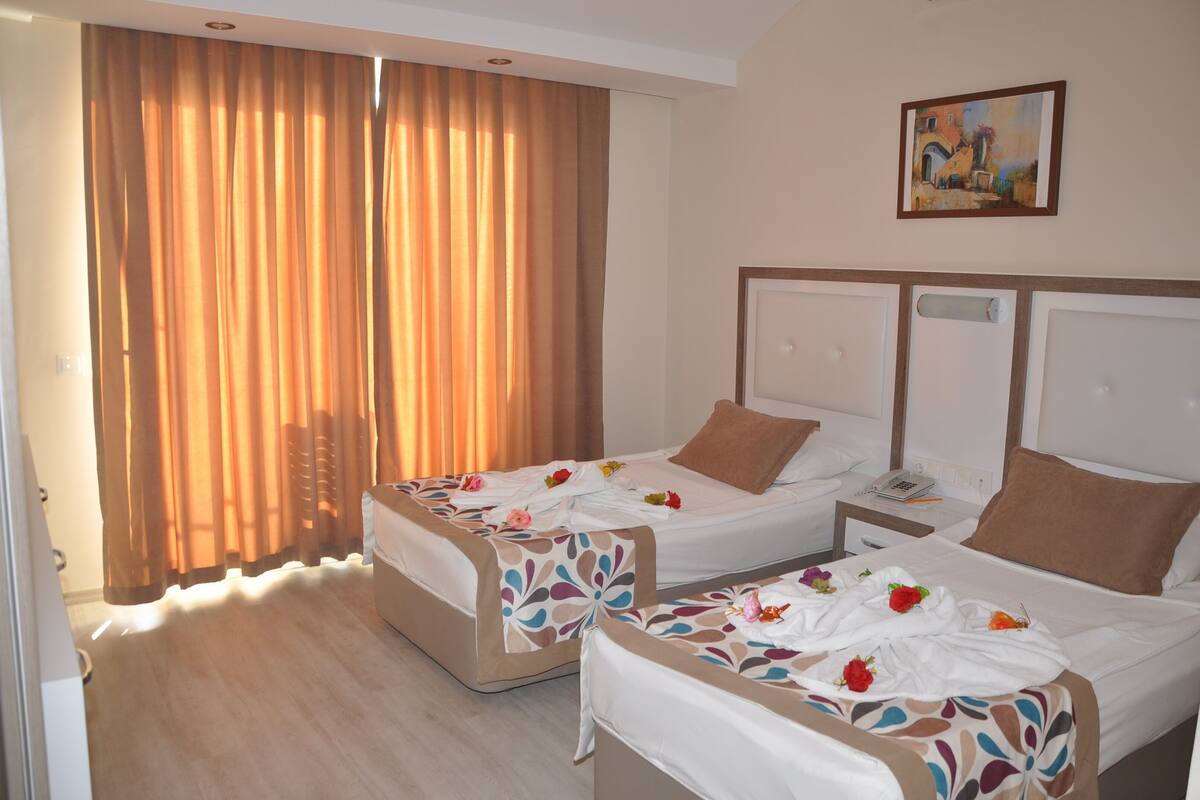Frette Italian sheets, down duvets, free minibar, in-room safe